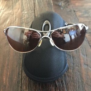 Oakley silver frames sunglasses amber lenses.